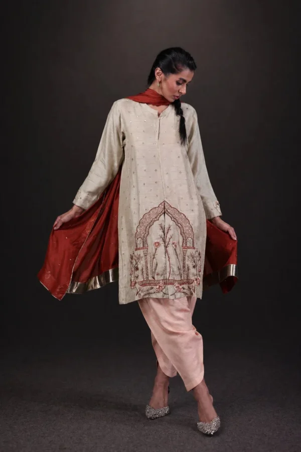 Ivory silk outfit with red dupatta, gallery view 1 — Dehleez-e-Taan