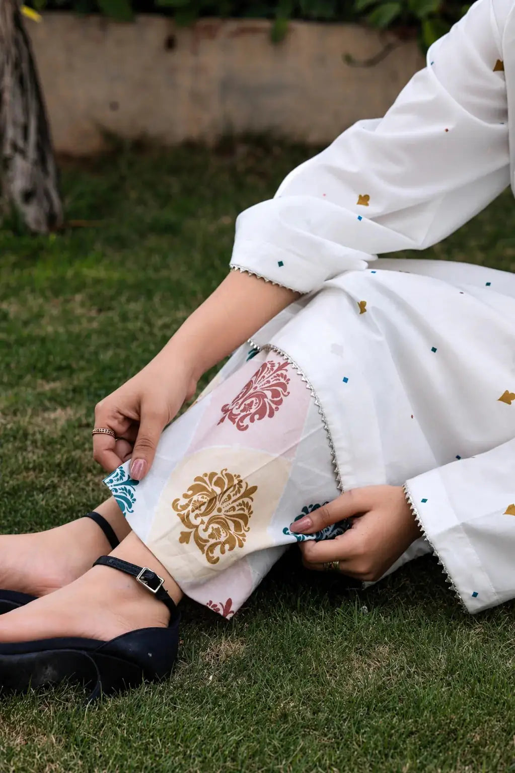 Alba cotton lawn suit — side view showing ruched neckline with dull gold lace and scattered diamond motifs, Sarah Tareen