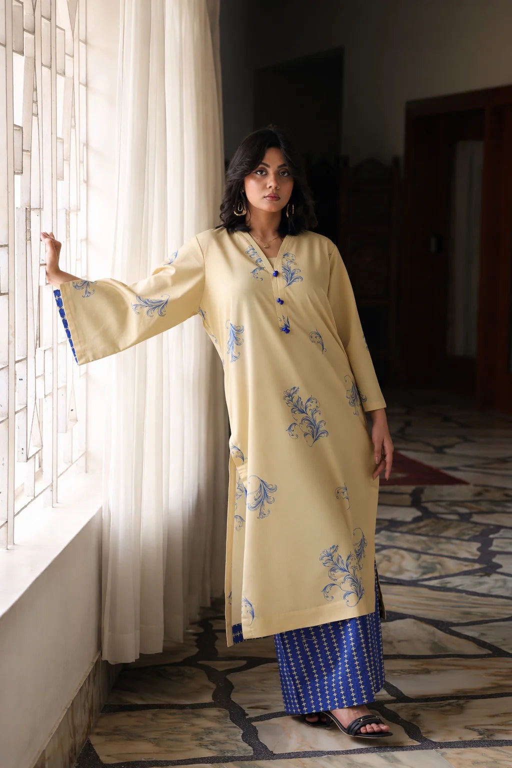 Aura cotton lawn suit — double cream shirt with scatter motifs and electric blue contrast palazzo trousers, Summer Sanctuary by Sarah Tareen