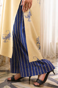 Aura cotton lawn suit — back view of cream shirt with scatter motifs and electric blue palazzo, Sarah Tareen
