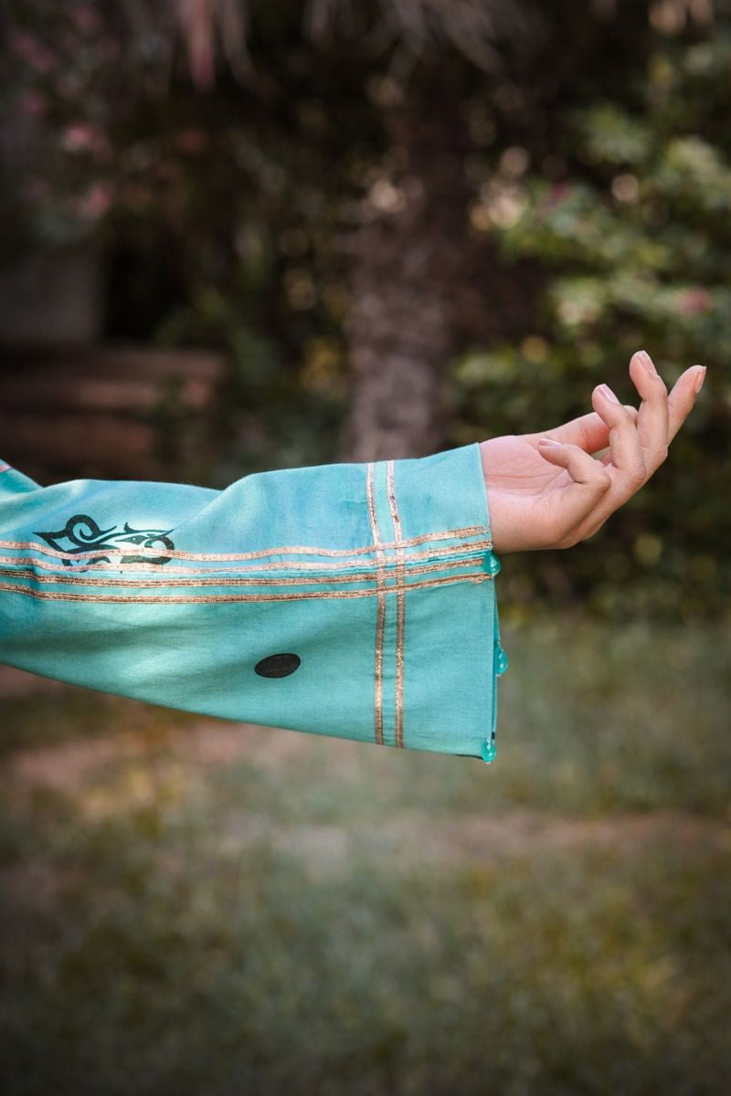 Luna lawn suit — side profile showing arch motif print and zari-striped shalwar, Sarah Tareen