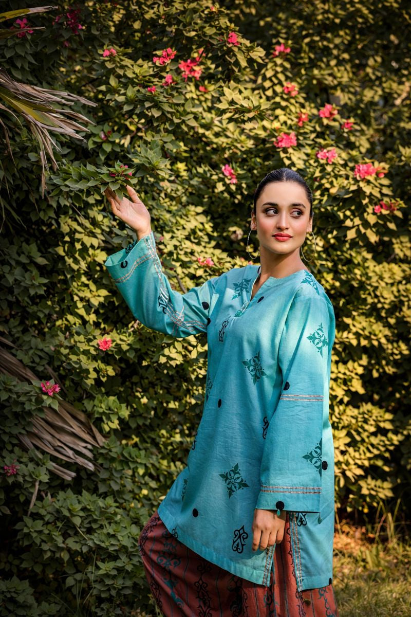 Luna cotton lawn suit — back view of floral print shirt with wide cuffed sleeves, Sarah Tareen