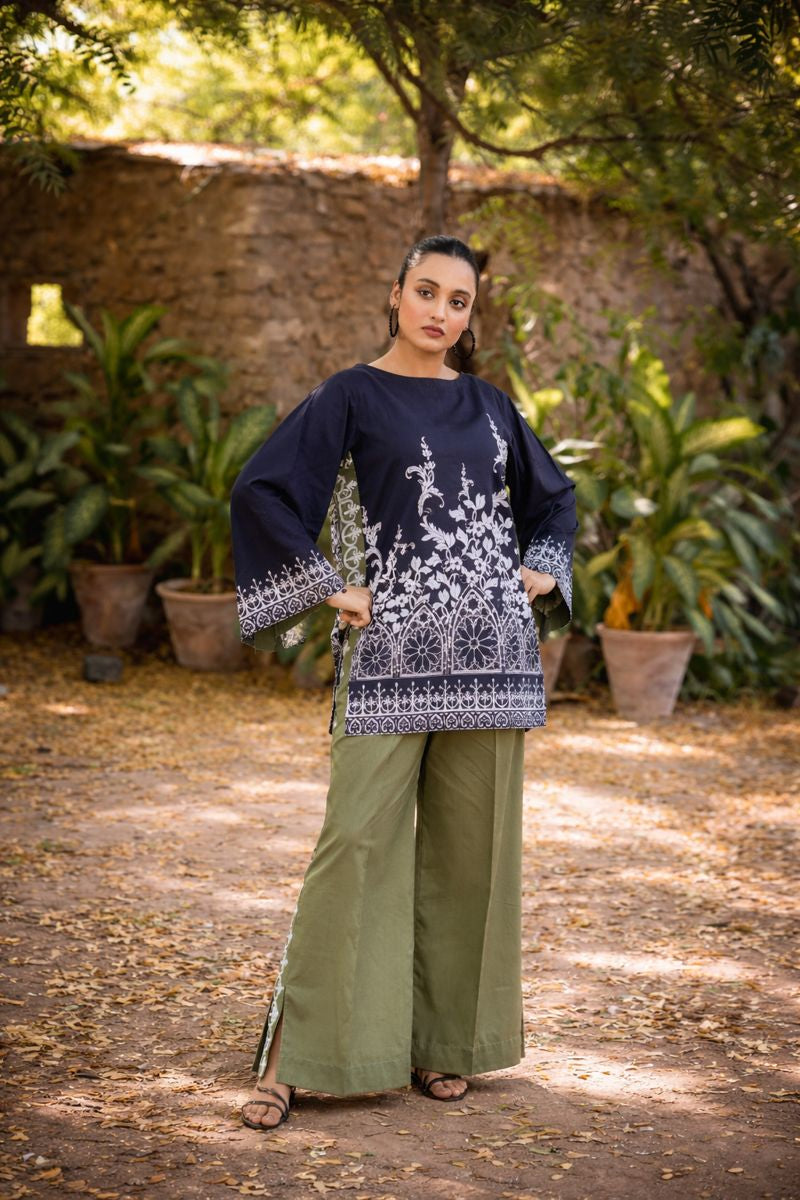 Slate lawn suit — draped view showing arch-scroll print and olive accent details, Summer Sanctuary by Sarah Tareen