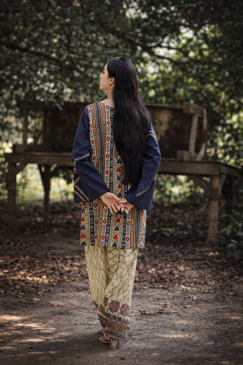 Lux lawn suit detail — close-up of navy lattice print with cream and rust colour blocking, Sarah Tareen