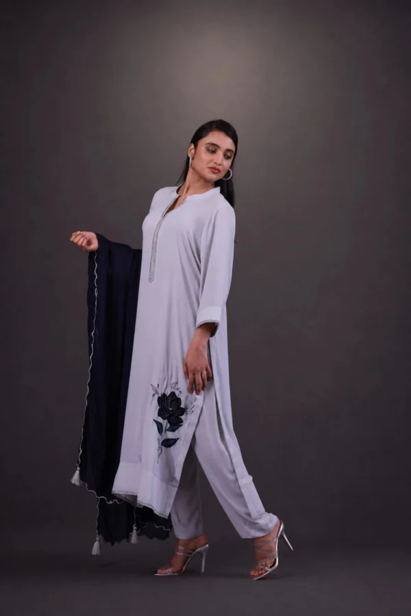 Model in white outfit with black dupatta — Khamosh Phool